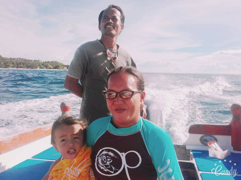 Junior, Nemesia and Baby Jane on the speed boat near Pamilacan