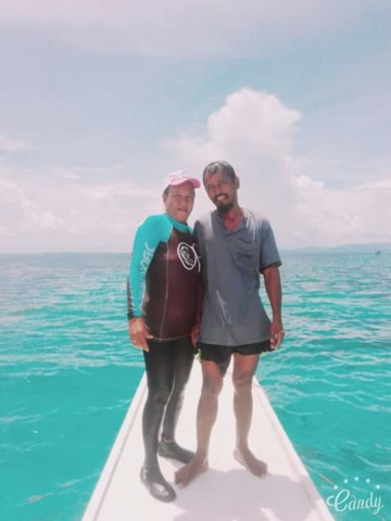 Nemesia and Junior on a bangka near Pamilacan